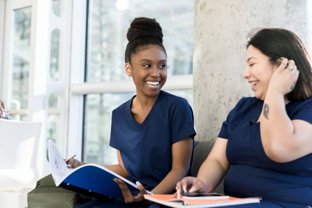 Evoke Health blog image with nurses happily talking