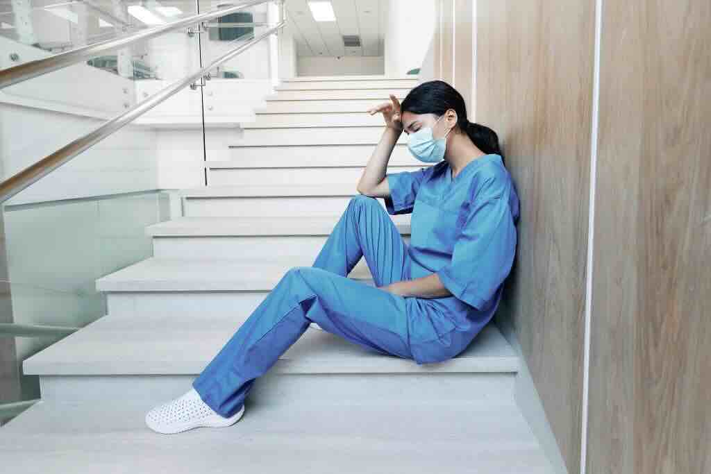 Evoke Health blog image with distressed nurse
