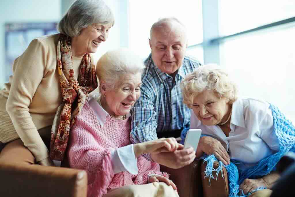 Evoke Health blog image with elder adults using tech