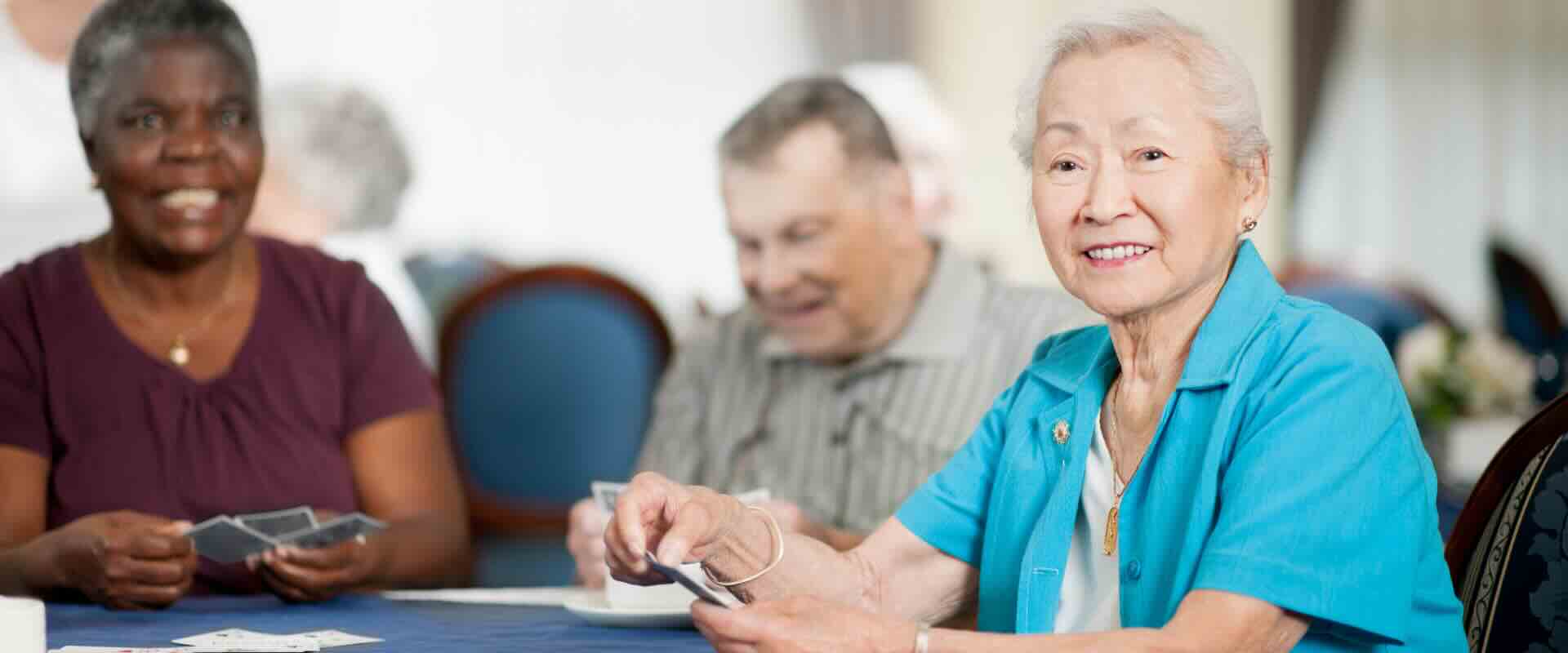 Evoke Health case study image with older adults playing cards